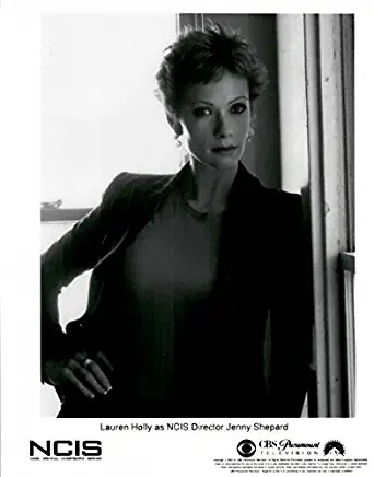 NCIS Lauren Holly as Director Jenny Shepard Standing Hand Resting on Hip Looking Serious Black and White 8 x 10 Inch Photo LTD6